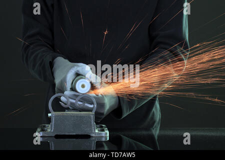 Turner working, close-up, isolated on black Stock Photo