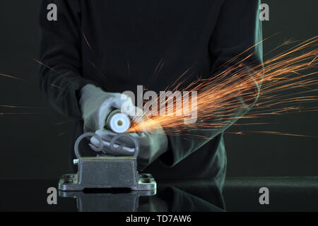 Turner working, close-up, isolated on black Stock Photo