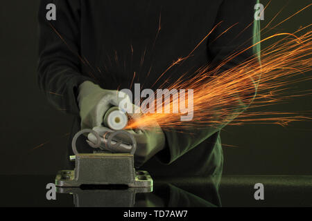 Turner working, close-up, isolated on black Stock Photo