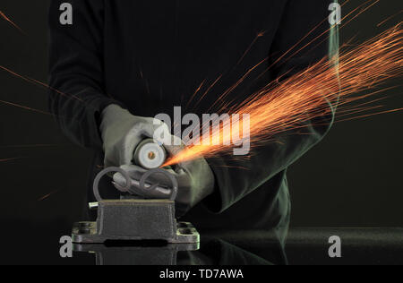 Turner working, close-up, isolated on black Stock Photo