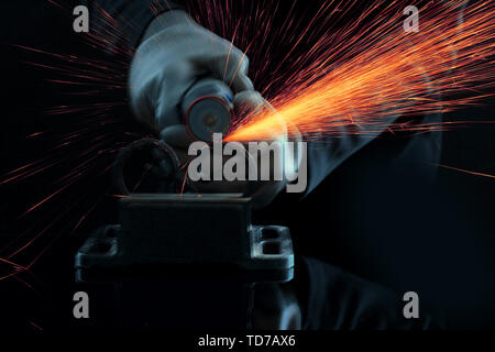 Turner working, close-up, isolated on black Stock Photo