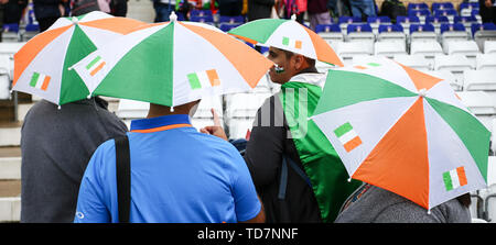 Trent Bridge, Nottingham, UK. 13th June, 2019. ICC World Cup Cricket, India versus New Zealand; A family of Indian fans all wearing Umbrella hats in their national colours Credit: Action Plus Sports/Alamy Live News