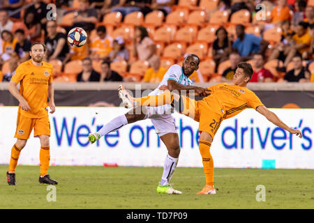 Houston, Texas, USA. 11th June, 2019. Austin Bold FC defender Amobi Okugo (15) and Houston Dynamo forward Ronaldo Pena (21) during a match between Austin FC and Houston Dynamo at BBVA Stadium in Houston, Texas. Houston Dynamo win 3-2. Maria Lysaker/CSM/Alamy Live News Stock Photo