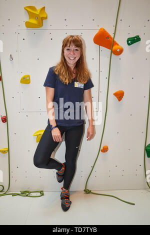 Hamburg, Germany. 13th June, 2019. Joanna Semmelrogge, actress, is standing at the climbing wall in the Europa Passage climbing with a celebrity. The celebrity climbing took place as part of the 'Climbing on the Alster' event, which will be a guest in the shopping arcade on Jungfernstieg from 11 to 15 June 2019. Credit: Georg Wendt/dpa/Alamy Live News Stock Photo