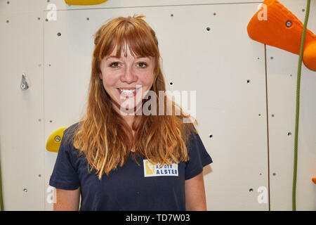 Hamburg, Germany. 13th June, 2019. Joanna Semmelrogge, actress, is standing at the climbing wall in the Europa Passage climbing with a celebrity. The celebrity climbing took place as part of the 'Climbing on the Alster' event, which will be a guest in the shopping arcade on Jungfernstieg from 11 to 15 June 2019. Credit: Georg Wendt/dpa/Alamy Live News Stock Photo