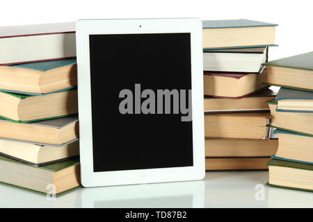 Tablet and books isolated on white Stock Photo