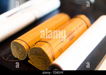 blank calligraphy scroll paper on table in modern study Stock Photo
