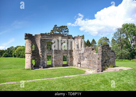 Looking over to the Ancient Scottish Ruins and Outbuildings of Old Eglinton in Irvine North Ayrshire Scotland Stock Photo