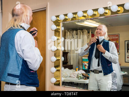 Father of the bride dresses for traditional church wedding; Congressional Church; Buena Vista; Colorado; USA Stock Photo