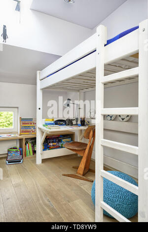 Desk under bunk bed in teen bedroom   UK & IRISH USE ONLY Stock Photo