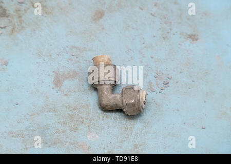 Old fitting for plastic pipe connection Stock Photo