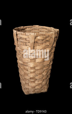 Old wooden wicker baskets for harvesting isolated on. Traditional baskets from Galicia, Spain Stock Photo