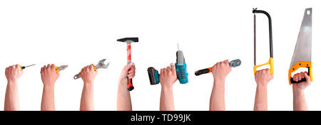 Hands with different tools isolated on white background. Stock Photo