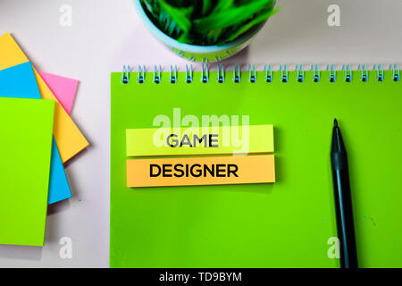 Game Designer text on sticky notes with office desk concept Stock Photo