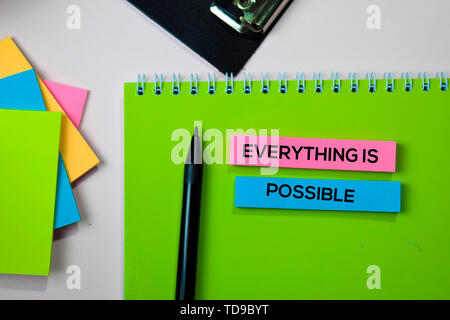 Everything is Possible text on sticky notes with office desk concept Stock Photo