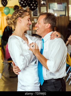 Bride & groom dancing at their wedding reception;  Congressional Church; Buena Vista; Colorado; USA Stock Photo