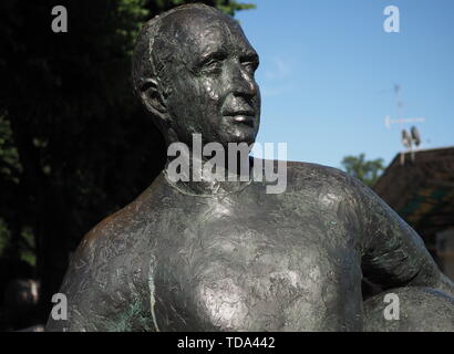 Monza, Italy - June 13, 2019: Statue of Argentine racing car driver Juan Manuel Fangio in the Autodromo Nazionale Monza, a race track located near the Stock Photo