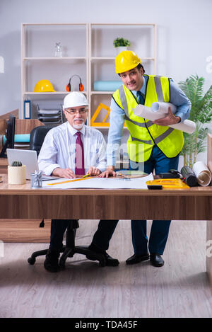Two architects working on the project Stock Photo