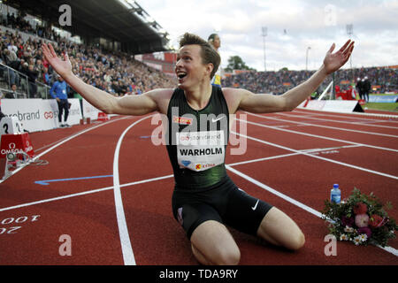 Oslo, Norway. 13th June, 2019. Karsten Warholm of Norway celebrates after winning the Men's 400m Hurdles at the IAAF Diamond League in Oslo, Norway, on June 13, 2019. Credit: Liang Youchang/Xinhua/Alamy Live News Stock Photo