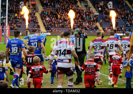 Emerald Headingley Stadium, Leeds, West Yorkshire, 14th June 2019. Leeds Rhinos and Wigan Warriors walk out ahead of the Betfred Super League fixture at Emerald Headingley Stadium, Leeds. Credit: Touchlinepics/Alamy Live News Stock Photo