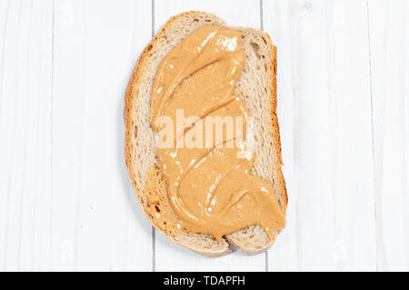 Peanut butter sandwiches. Healthy breakfast, bread with peanut butter Stock Photo