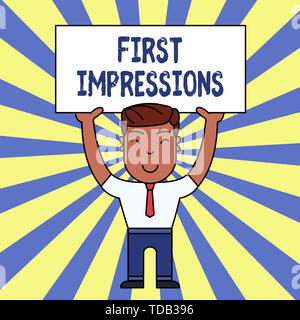 Handwriting text writing First Impressions. Conceptual photo What a demonstrating thinks of you when they first meet you Smiling Man Standing Holding  Stock Photo