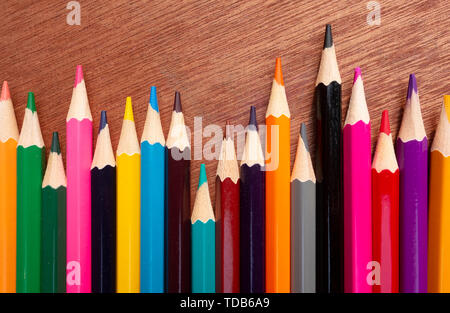 A neatly arranged colored pencil on the table. Stock Photo