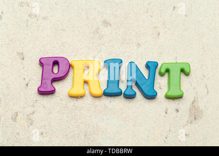 The word 'PRINT' written in plastic colorful letters Stock Photo