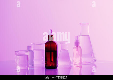 retro brown bottle with flask in science laboratory background Stock Photo