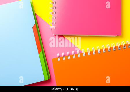 Composition with copybooks on two tone background, space for text Stock Photo