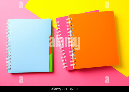 Composition with copybooks on two tone background, space for text Stock Photo