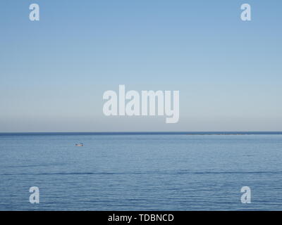 Mediterranean Sea landscapes seen from african M'diq city in Morocco with clear blue sky in 2019 warm sunny spring day at evening on April. Stock Photo