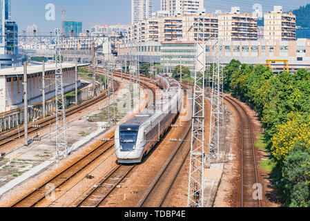 Highspeed train on the railway station at day time. Shenzhen. China. Stock Photo