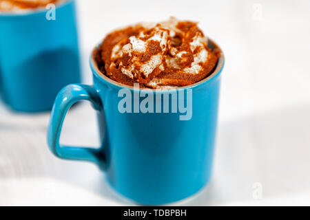 09 Jun 2019 Hot chocolate with whipped cream and a dusting of cocoa powder Stock Photo