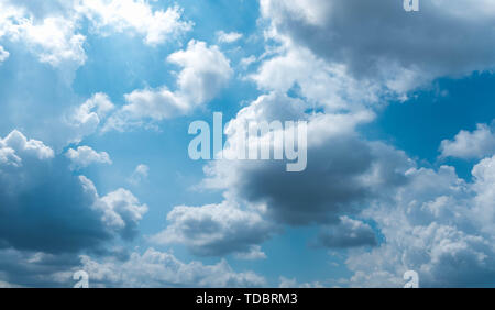 Clouds at sunset before rain blue sky white and grey clouds Stock Photo