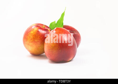 nectarines on white background Stock Photo