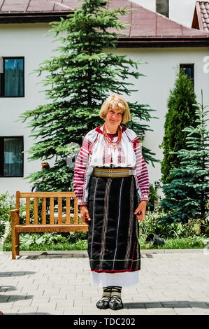 Sibiu, Romania - June 5, 2019: Traditional romanian female dress, with woman dressed in a typical way. Stock Photo