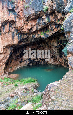 The Grotto of the God Pan 3rd Century BCE filled with water ,Hermon Stream Nature reserve and Archaeological Park ,Banias, Golan Heights Israel Stock Photo