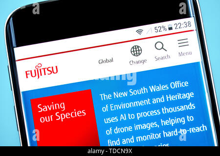 Berdyansk, Ukraine - 10 June 2019: Fujitsu website homepage. Fujitsu logo visible on the phone screen, Illustrative Editorial. Stock Photo