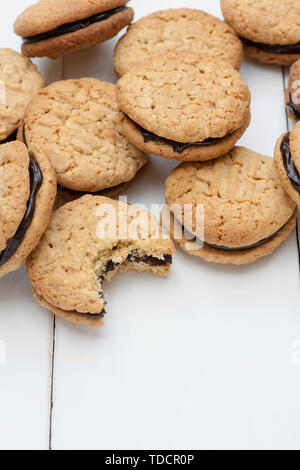 Homemade kingston biscuits. Australian biscuit. Round coconut and oat biscuits with chocolate cream in the middle Stock Photo