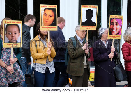 Edinburgh, Scotland, UK. 14th June 2019.  Silent Vigil for the Grenfell Fire disaster, in Castle Street Edinburgh. On the second anniversary of the Grenfell fire, campaigners hold a silent vigil.  Credit: Craig Brown Stock Photo