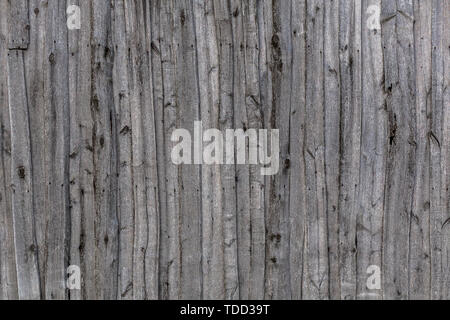 gray wooden weathered barn wall flat background template. Stock Photo