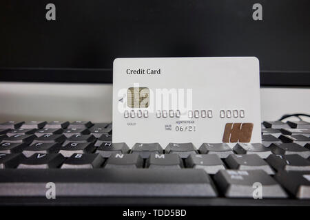 Credit card on the keyboard. Stock Photo