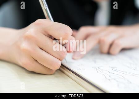 Students are taking notes in class Stock Photo
