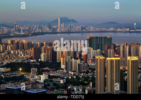 Scenic night view of Shenzhen Bay coastal city Stock Photo