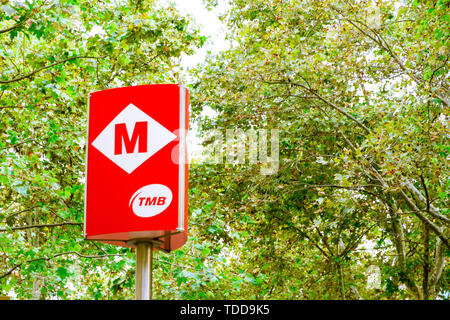 Barcelona, Spain - September 08, 2018: Trees and subway sign in the Rambla in summer in Barcelona, Spain Stock Photo