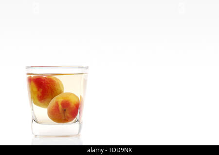 Japanese plum wine called umeshu on white background Stock Photo