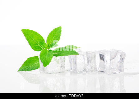 Fresh mint leaves and ice cubes, crisp summer Stock Photo