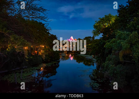 Orlando , Florida. May 03, 2019.Panoramic view of Expedition Everest mountain, river and rainforest on blue night background in Animal Kingdom  (1) Stock Photo