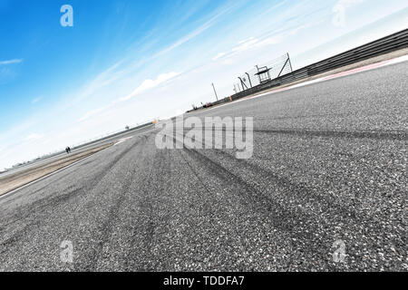Empty asphalt road in blue cloudsky Stock Photo